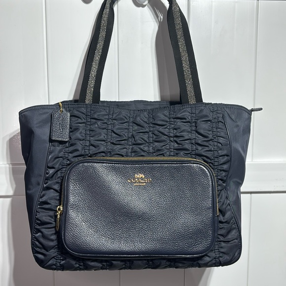 Coach Handbags - Coach navy blue ruching zip top Court Tote with front blue leather pocket